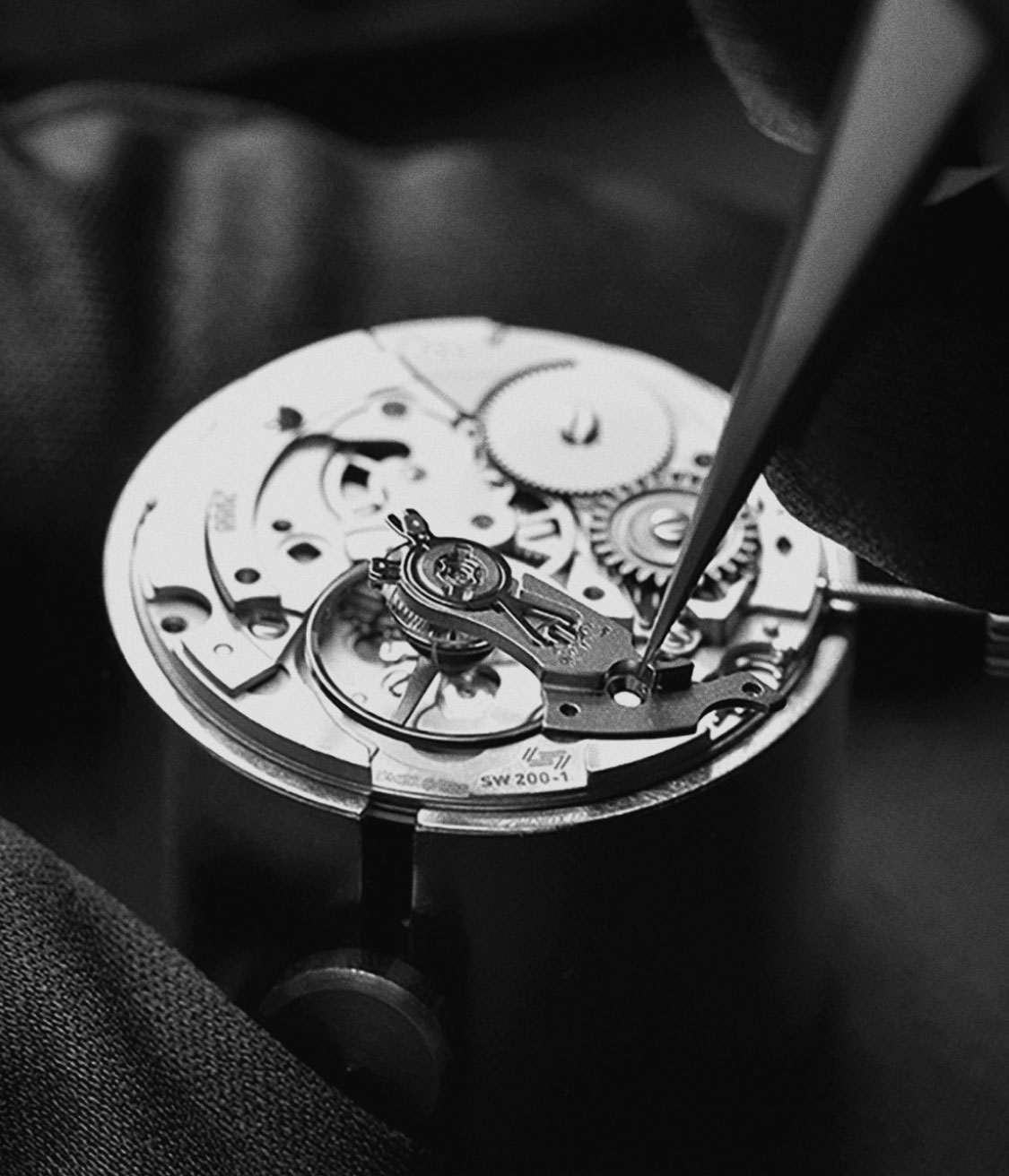 watch maker working on a timepiece