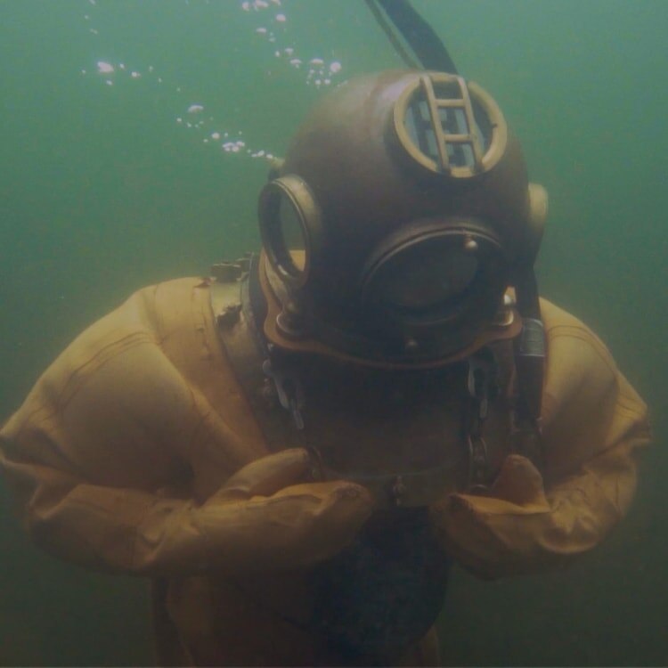 Vintage scuba suit underwater.