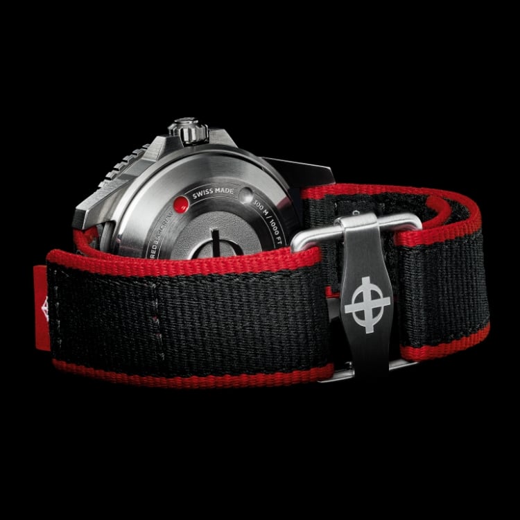 The back of the Super Sea Wolf Pro-Diver Zodiac x RedBar watch with focus on the red and black strap buckle featuing the Zodiac crosshair logo 