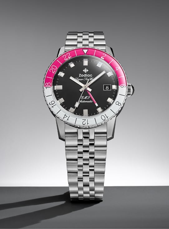 A Zodiac GMT watch.