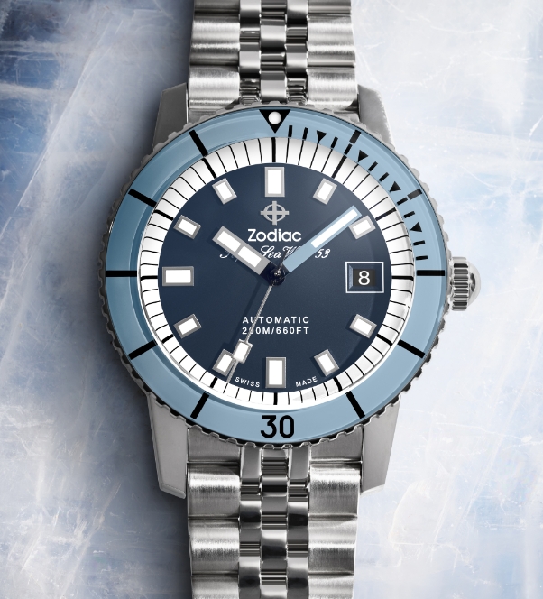 Detail shot of a Super Sea Wolf Compression Diver watch featuring a baby blue bezel surrounding a dark blue dial.