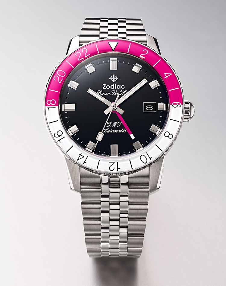 Detail shot of a Super Sea Wolf GMT watch with a pink and white bezel and stainless steel strap