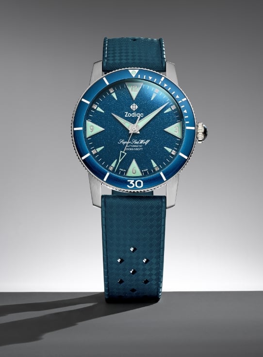 A Zodiac GMT watch.