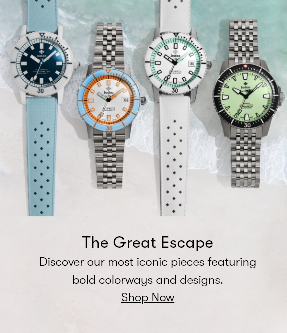 Four Zodiac Super Sea Wolf watches against a beach background.