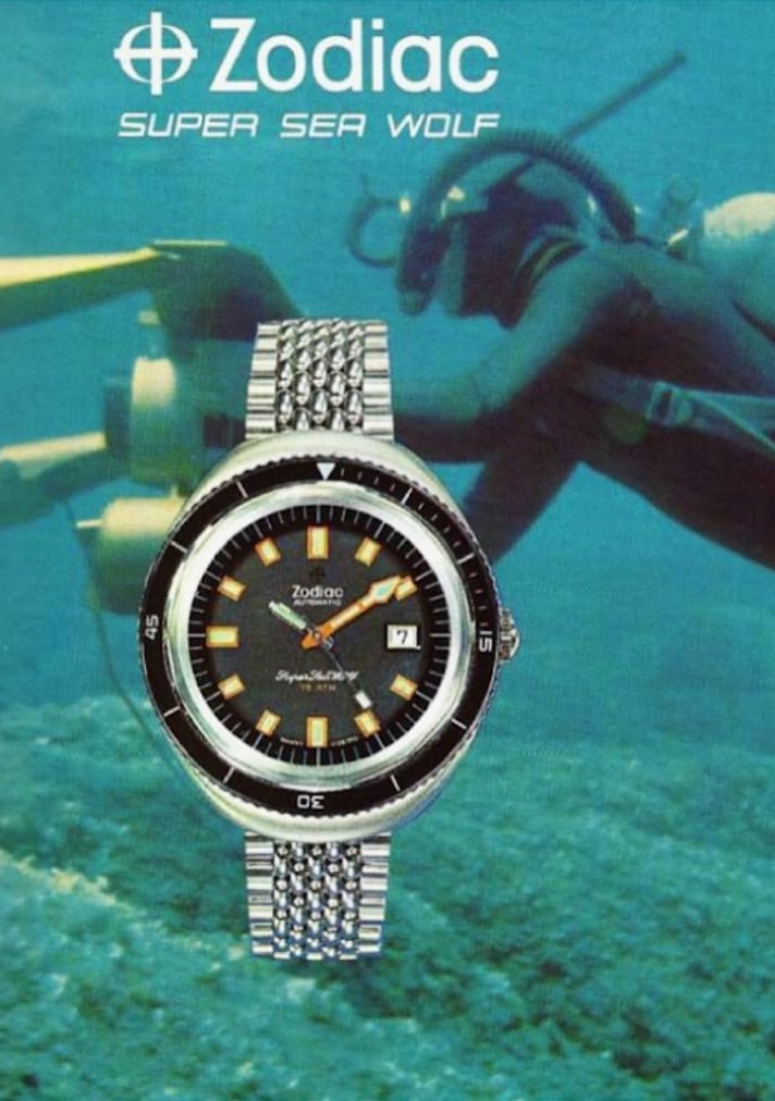 Watch craftsman examining a watch.