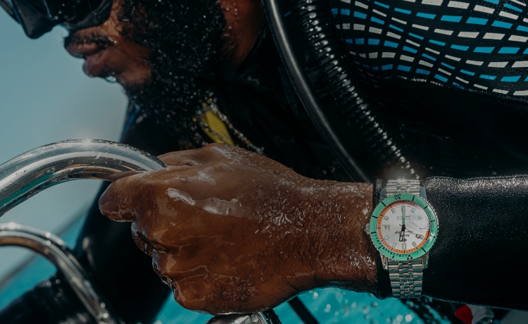 Diver wearing a Zodiac watch.