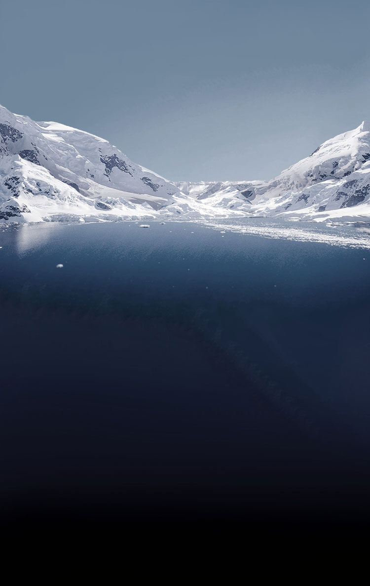 Three Zodiac watches against a background of icebergs