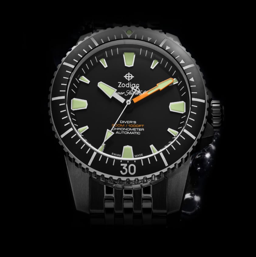 Detail shot of a Super Sea Wolf Pro-Diver watch featuring a pistachio dial, black bezel and stainless steel case