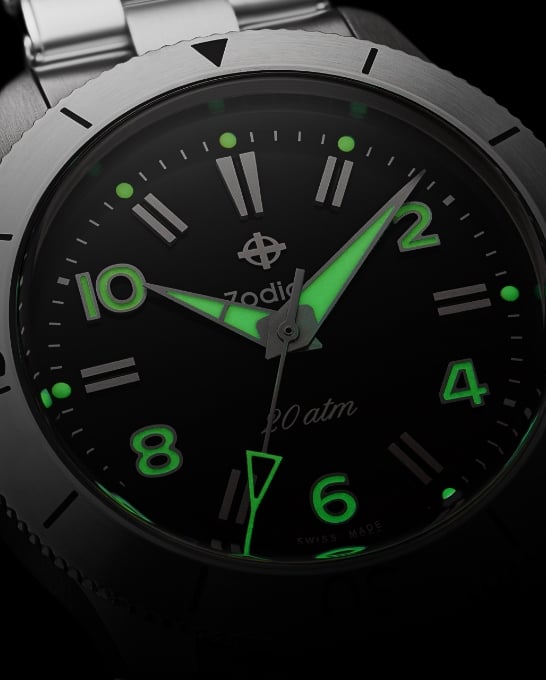 Detail shot of the Super Sea Wolf Ref. 691 watch with focus on the activated Super LumiNova® hands and markers..