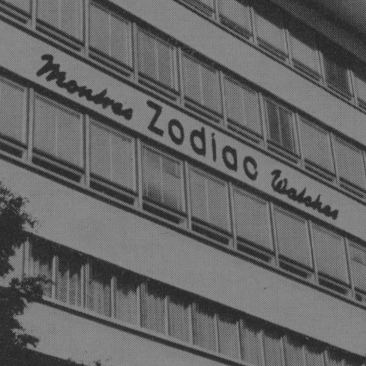 A vintage Zodiac building sign.