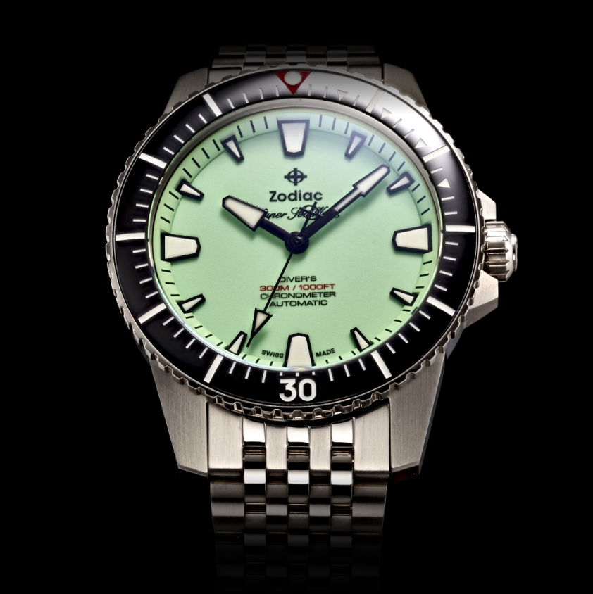Detail shot of a Super Sea Wolf Pro-Diver watch featuring a pistachio dial, black bezel and stainless steel case
