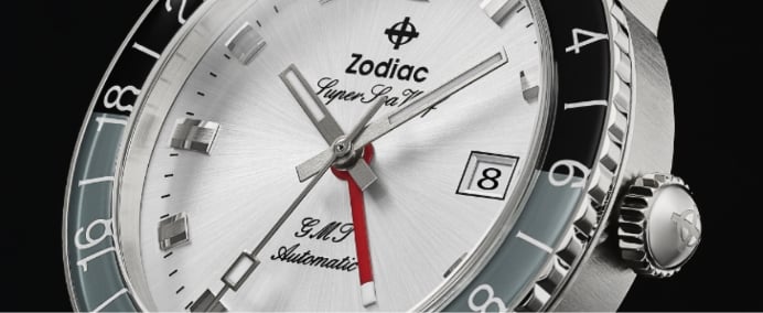 Detail shot of a Super Sea Wolf GMT watch with a split black and grey bezel.