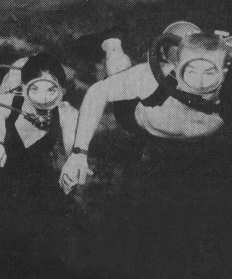 Black and white vintage photo of two people snorkeling.