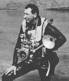 A vintage photo of a diver with his camera